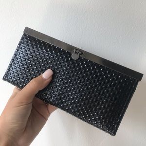 Black textured clutch